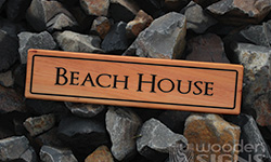 Beach house macrocarpa sign 500 x 140
